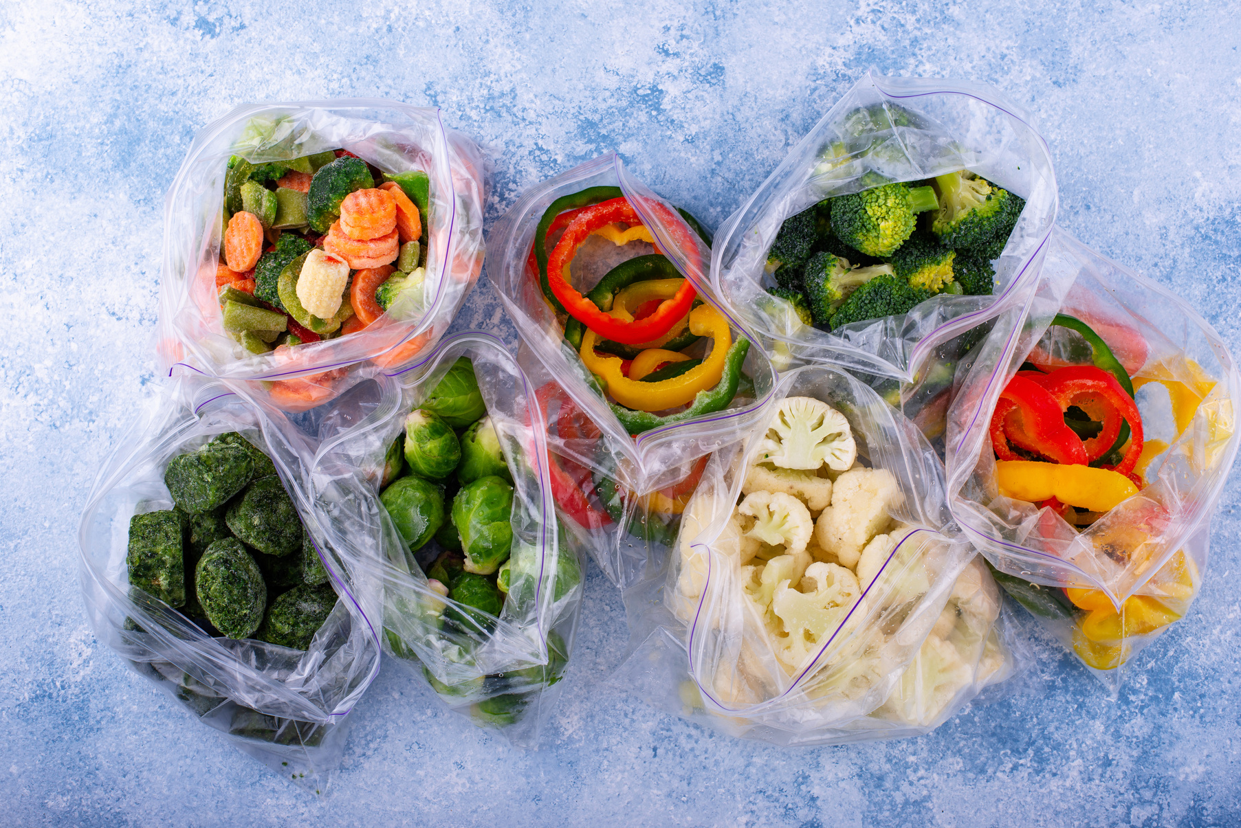 Different frozen vegetables. Food storage.